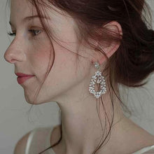 画像をギャラリービューアに読み込む, ブライダル ウェディング ウエディング小物 大ぶりサイズ ブライダルピアス パーティーにも【コローラ】